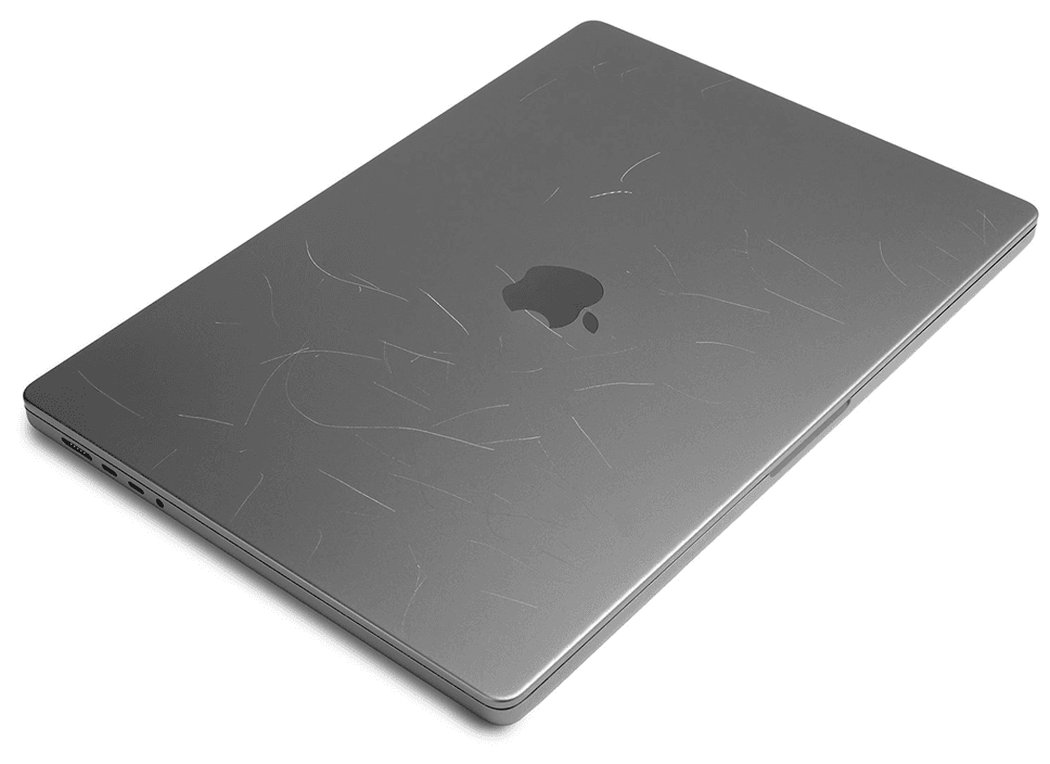 Scratched MacBook with skin protection